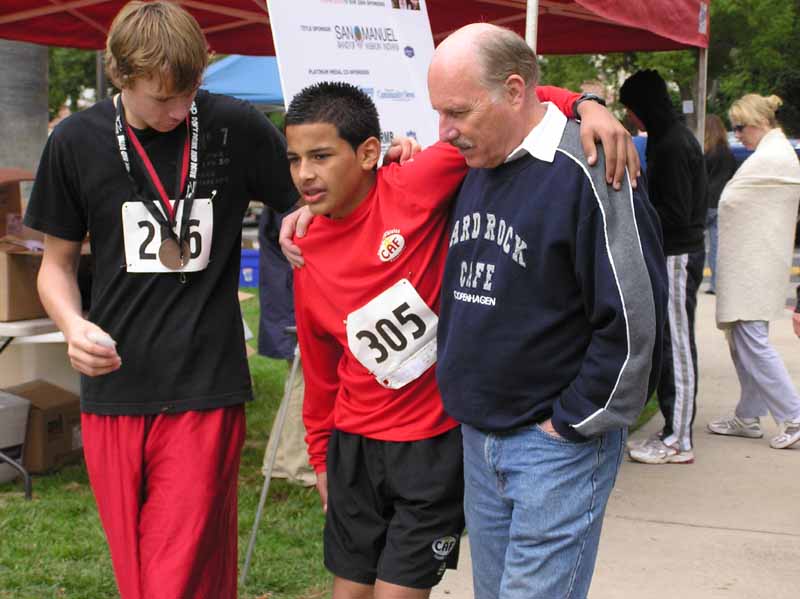 570 Josh, a serious contender who was the Number One EE kid until close to the end, had a serious cramp but still got to the finish before everybody else -- except it was in a police car